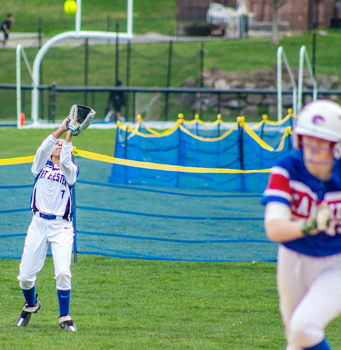 Leftfielder Skylar Sams catches a fly ball in the outfield during Port Chester’s home game against Carmel on Wednesday, Apr. 10. The Lady Rams lost that contest 18-0.