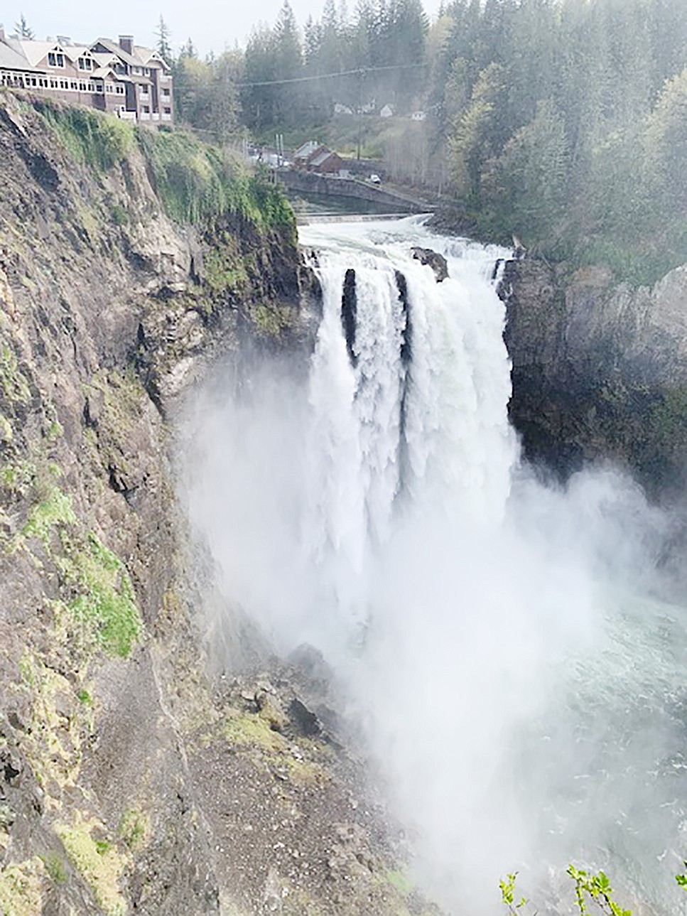 Snoqualmie Falls, Washington, the spectacular natural wonder whose historic hydroelectric plant supplies renewable electricity to the Greater Seattle region.