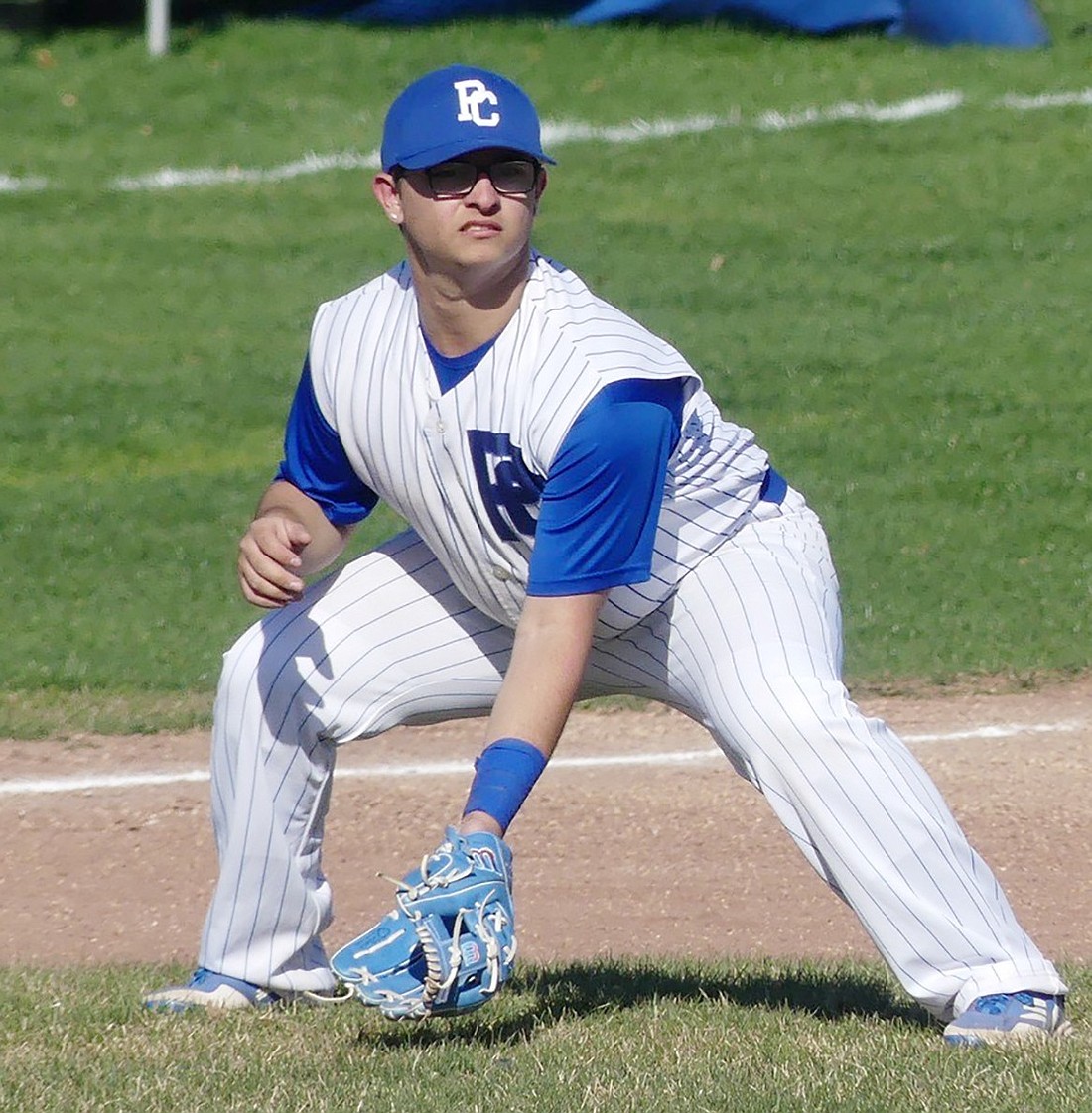 John “Tommy” Tomassetti hit a ball that ricocheted off the Mamaroneck High School main building for a crucial home run that tied the Rams’ game against the Tigers at 5-5 on Wednesday, Apr. 10.