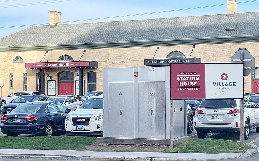 Sign for Port Chester Station House and Village Beer Garden at the entrance to the Metro-North commuter lot on Broad Street. The restaurant and beer garden closed Jan. 1, 2019. At this point the sign, marred with graffiti, has become an eyesore.
