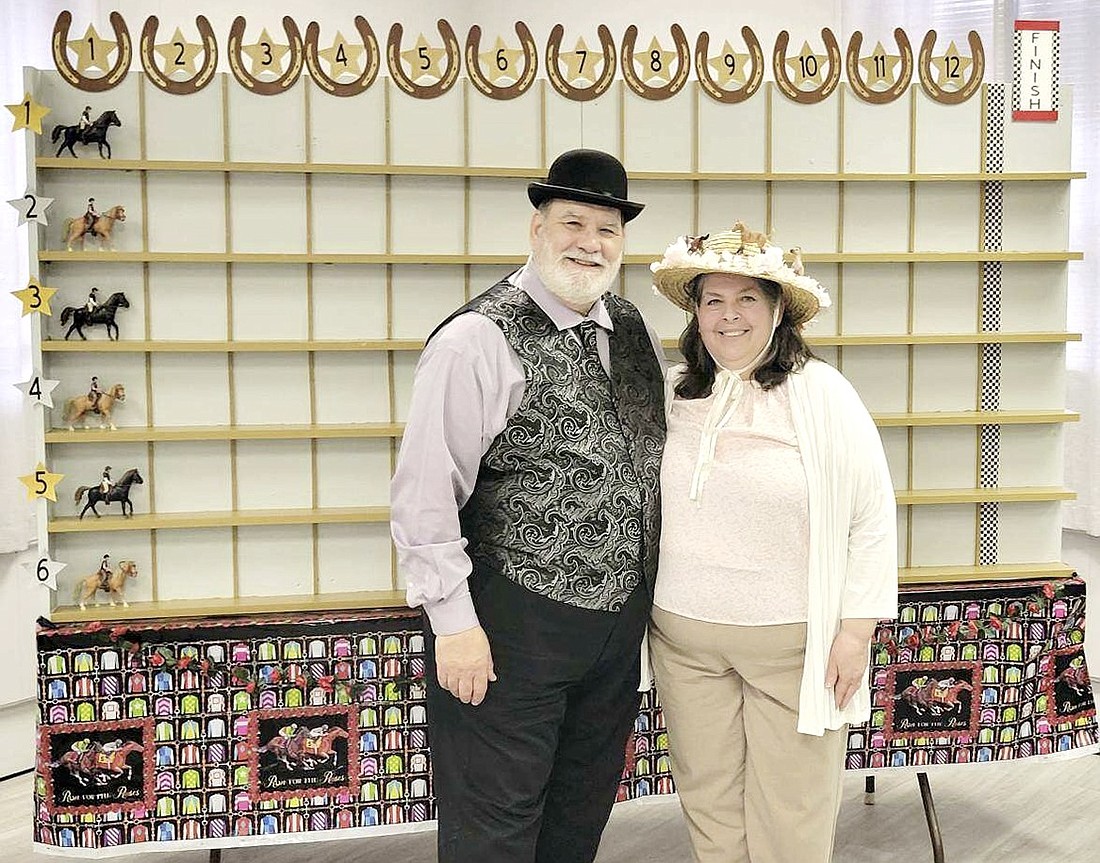 The Ladies Auxiliary of the Knights of Columbus in Port Chester hosted its annual Night at the Races on Friday, Apr. 19. The event raises money for the group's charities. There were 75 people in attendance. Charlie and Toni Sacco dressed for the occasion.