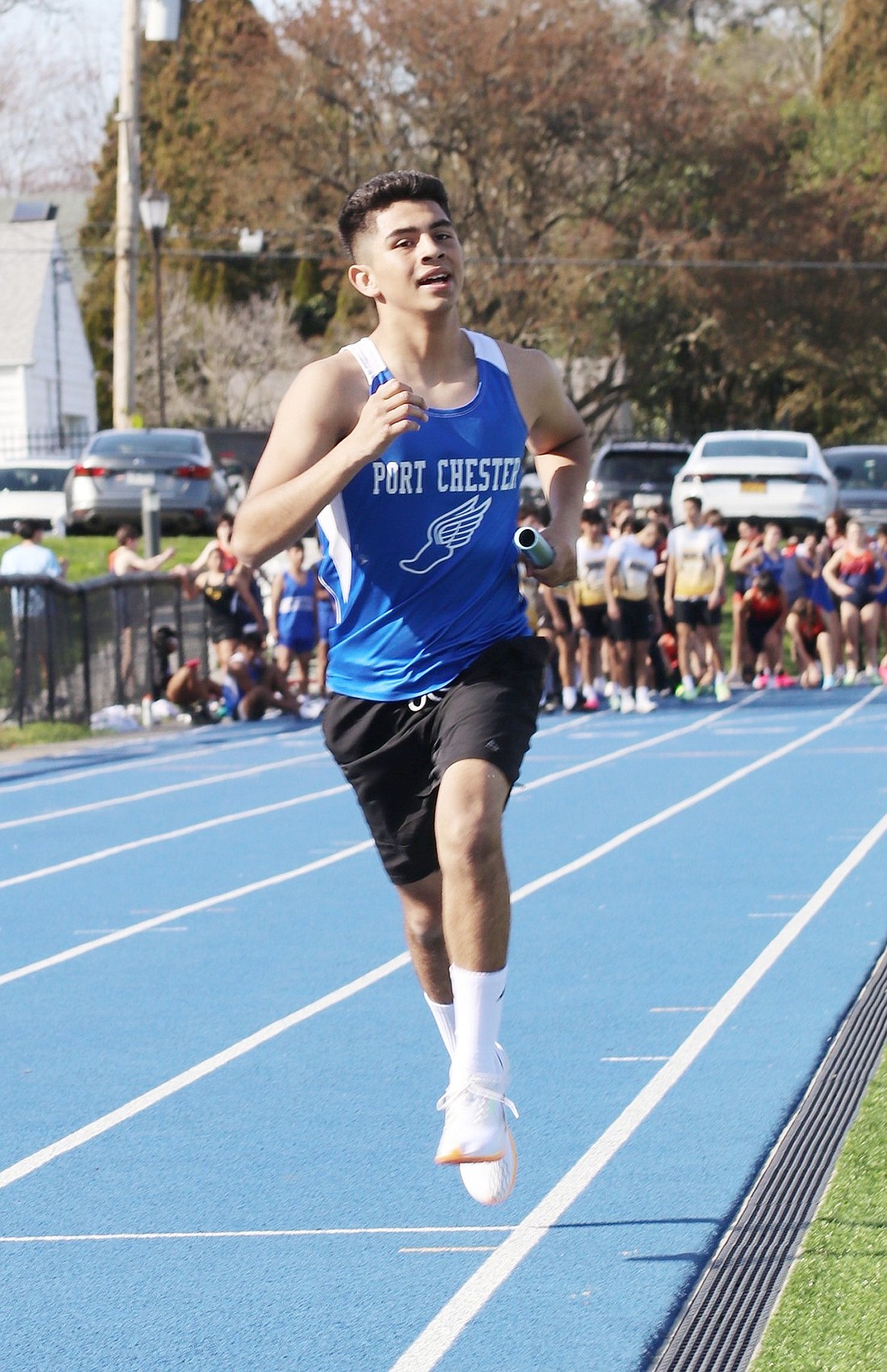 Port Chester Ram Arturo Orozco competes in the 4x800-meter relay as one of four runners along with Jonathan Abraham, Santiago Marquez and Alejandro Salinas who finished second in the dual meet at Port Chester High School against White Plains and Lakeland Panas on Monday, Apr. 15.