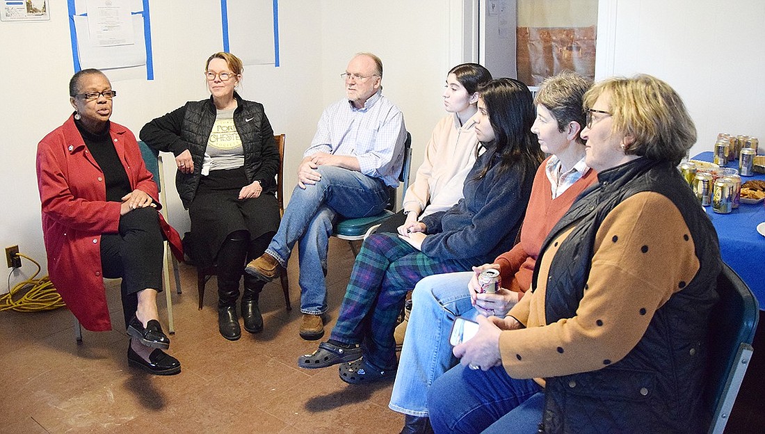 Port Chester Trustee Joan Grangenois-Thomas (left), Kikki Short, St. Paul’s Church Pastor Jim O'Hanlon, Port Chester High School juniors Sonia Anaya and Barbara Martinez Cordero, Alison Nicholls and County Legislator Nancy Barr gather in the Bush-Lyon Homestead for the “How Did We Get Here?” discussion group on Thursday, Apr. 25. Hosted by the Port Chester Historical Society and the Read, Talk, Act book club, the discussion centered around the “Amended” podcast, focusing on the complex history behind the women’s suffragist movement.