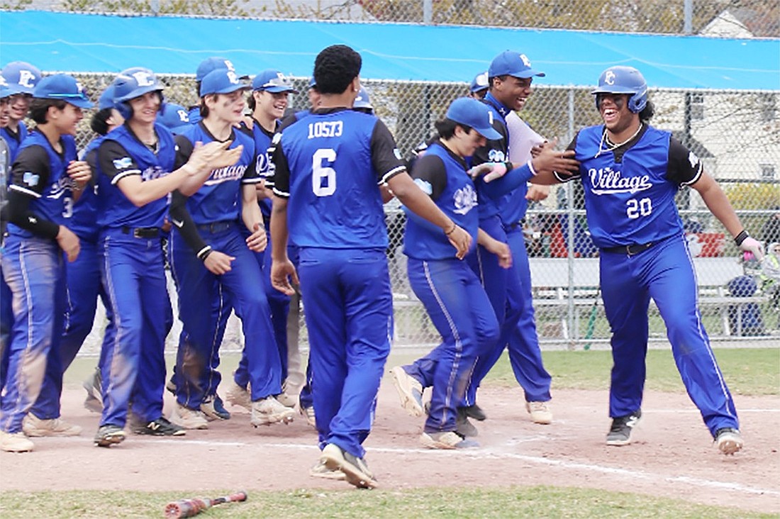 Josh Virella celebrates with the Rams after hitting a homerun in the championship game of the Anthony Foust Tournament last Saturday, Apr. 27 against Blind Brook. Port Chester won that game 10-5 to clinch the tourney title.