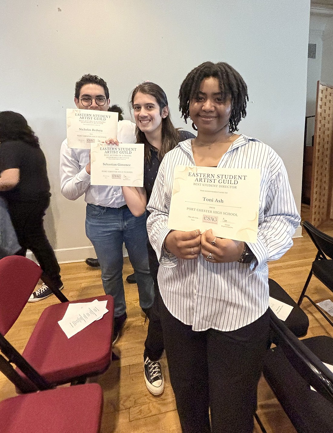 Port Chester High School junior Toni Ash (front), senior Sebastian Gimenez and senior Nicholas Bedoya pose with their certificates as winners of the first Eastern Student Artist Guild (ESAG) awards at Manhattanville University on Saturday, May 4. The new guild is giving recognition to non-musical performances.