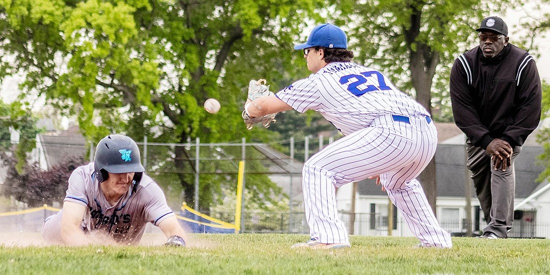 Port Chester third baseman John Tomassetti attempts to tag an opponent at third during the Rams’ Monday, May 14 game against John Jay/East Fishkill, their last game of the regular season.