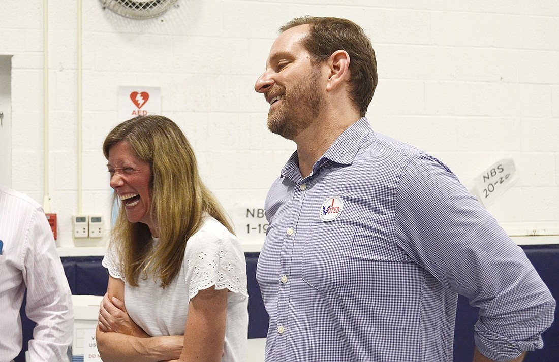 Windsor Road resident and Board of Education member-elect Correy Stephenson shares a laugh with Trustee Scott Jaffee on election night Tuesday, May 21, as he jokes about the friendly competition between her and Jeffrey Mensch, the other candidate in the uncontested race. Having won, she will be taking Jaffee’s seat at the end of his term on June 30.