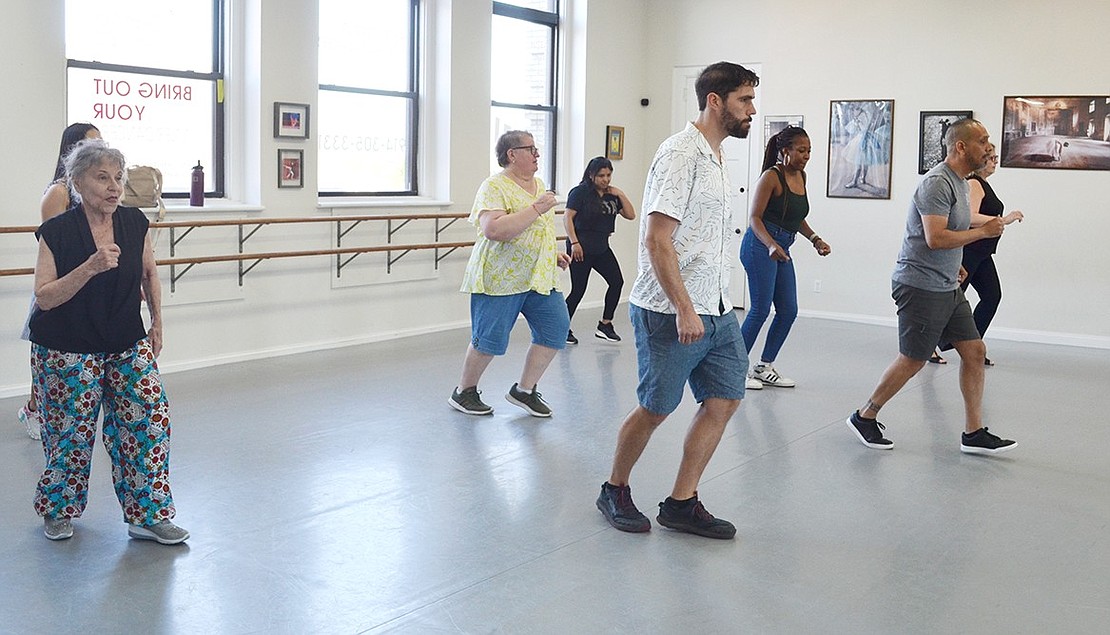 Angel Alsina (front) teaches a salsa class at Jeté Dance Studio on Pearl Street. Among the dancers are Robin Wolfson (back left) of Port Chester, Andrew Wolverton of Greenwich (front left) and Ana Provenzano of Rye Brook (front right).