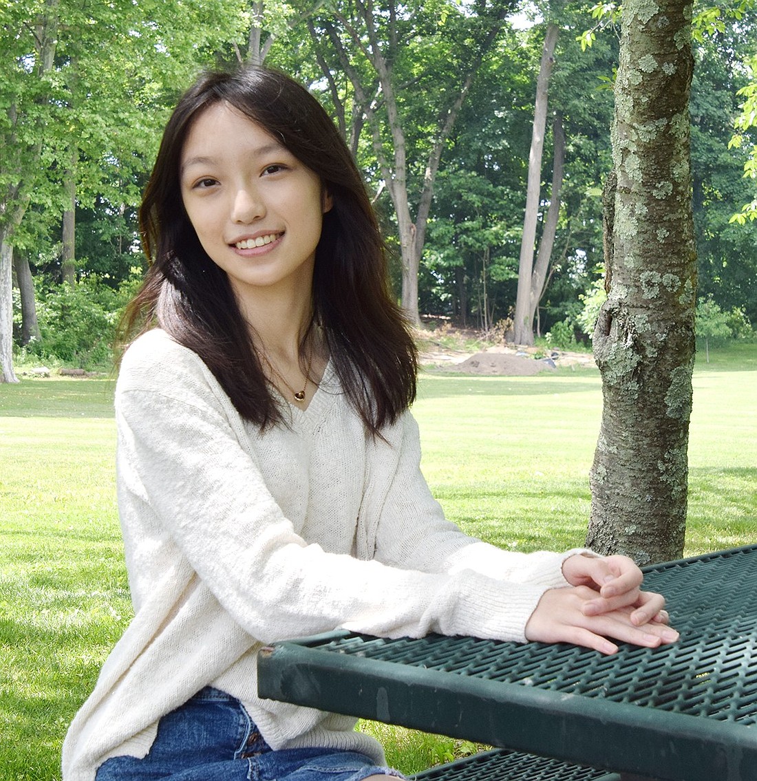 Blind Brook High School senior Fiona Chen poses for a photo at Harkness Park on Tuesday, June 4. Chen is the school’s sole winner of a 2024 National Merit Scholarship award.
