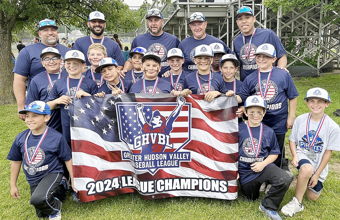 The Port Chester Youth Baseball League 9U Pirates after winning the Greater Hudson Valley Baseball League title for their age group on Sunday, June 2. Back row, from left: Coaches Anthony Rende, Andy Ianello, John Umbro, Rob Brenzel and Chris Bosch. Middle row, from left: Adrian Fernandez, Michael Capozza, John Umbro, Mason Sabando, Sebastian Martinez, Jake Giron, Anthony Rende, Jayden Bautista, Isaiah Di Bella, Luke Liebenstein, Ava Ianello. Front row, from left: Jose Samano, Zachary Brenzel and Joe Rende, an honorary Pirate.