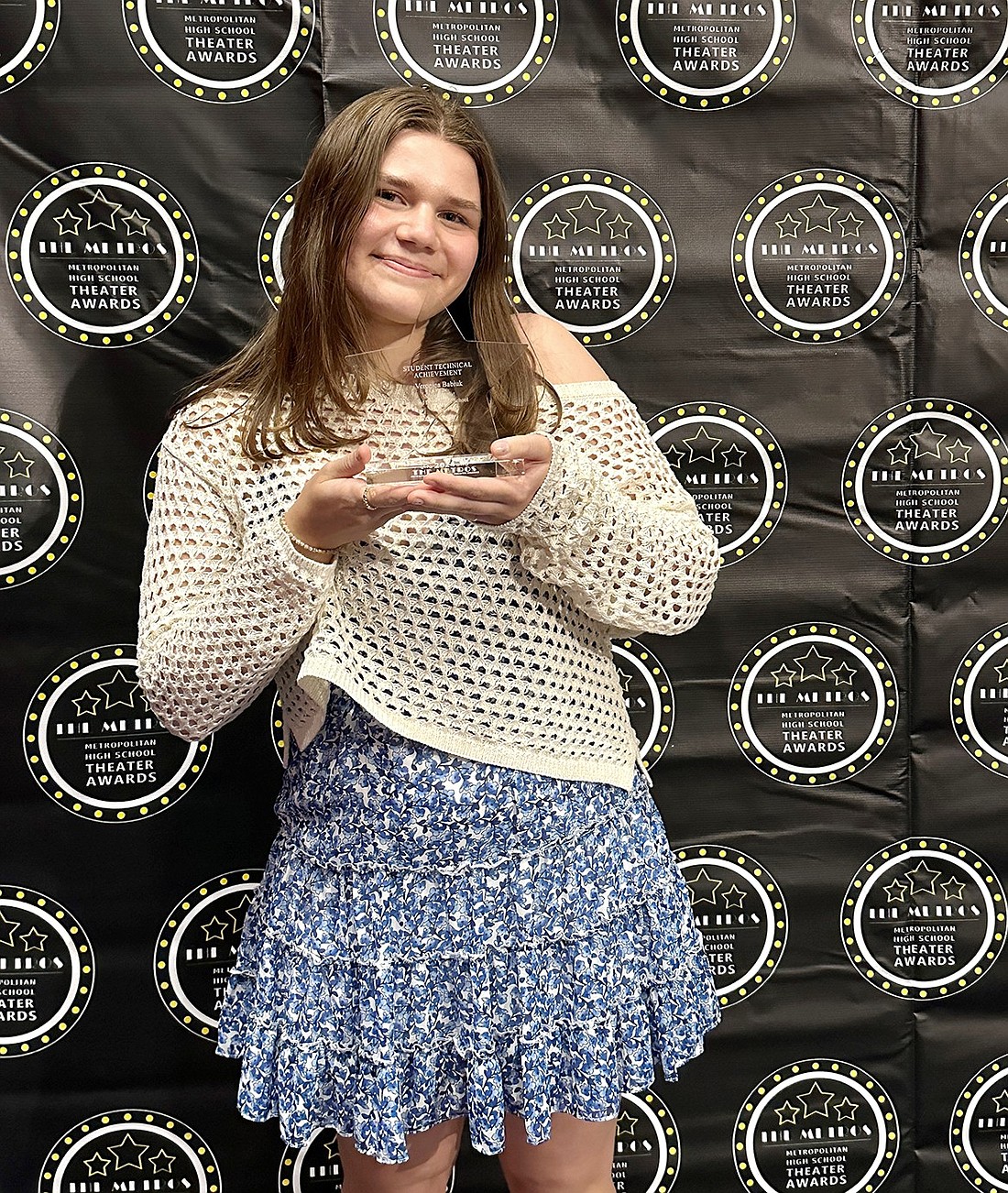 As a first-time nominee representing the Blind Brook High School Drama Club crew, junior Veronica Babiuk holds up the Metro Award she won on Monday, June 10, as stage manager for their spring production of “Mamma Mia!”