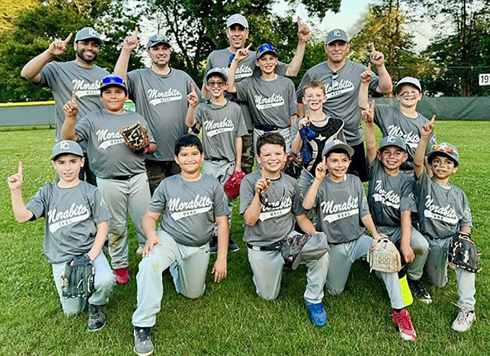 Morabito HVAC Minor League champions. Front row, from left: Liam Horgan, Julian Restrepo, Michael Capozza, Charles Brigante, Vincent Nunziato, Ryan Ramos. Middle row, from left: Sebastian Martinez, Christopher Conte, Judah Geller, Chase Steers, Shane Berkowitz. Coaches, from left: Richard Ramos, Chris Horgan, Noah Geller, Frank Nunziato.