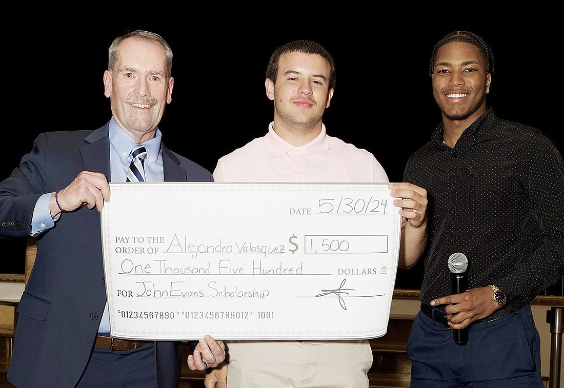 Dr. Joe Durney, STEER CEO, with multi-sport Ram athletes Colin Taylor and Alejandro Velasquez., winners of John Evans $1,500 scholarships at the STEER for Student Athletes 10th annual graduation banquet May 30 at Casino Royale in Yonkers.