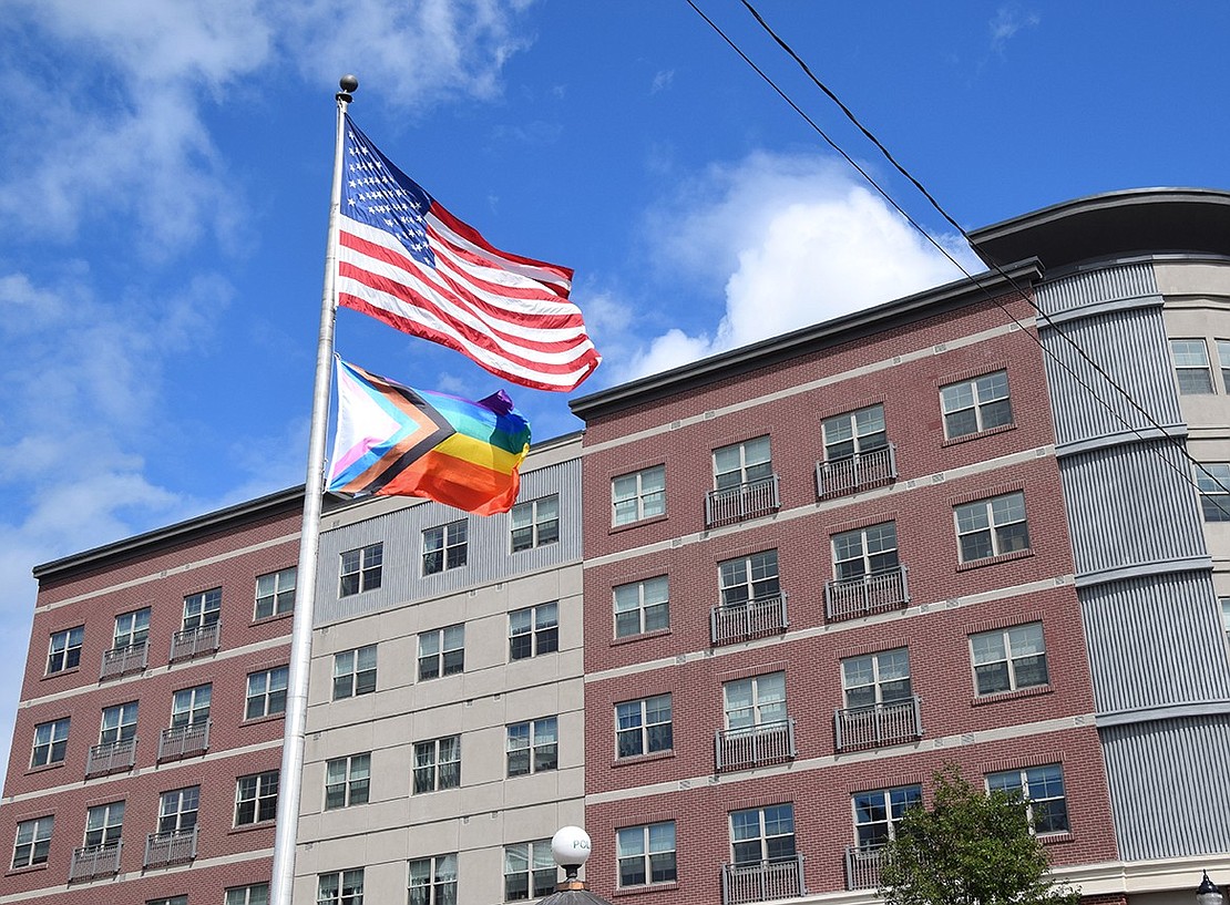 After being raised on Saturday, June 22, the Pride flag flies high in Liberty Square.