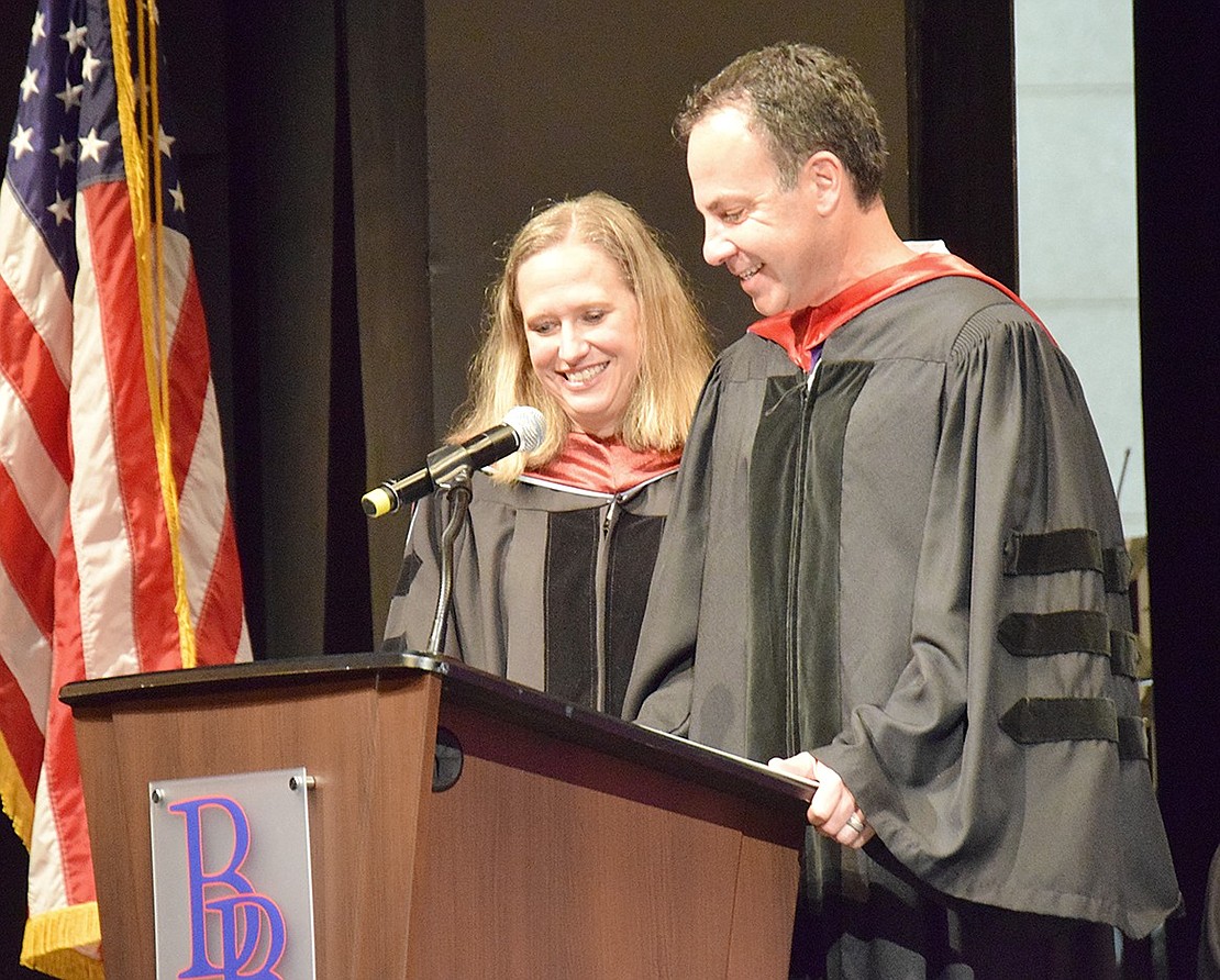 The time finally comes: Principal Jennifer Chirles presents the Class of 2024 to Board of Education President Jeff Mensch, certifying them as graduates of Blind Brook High School.