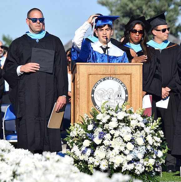 Soon-to-be graduate Bryan Ramirez takes the spotlight and sings “The Star-Spangled Banner” at the start of commencement.