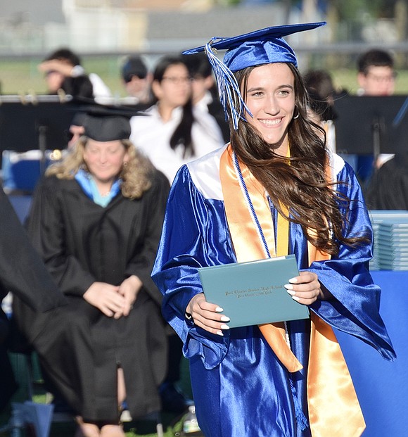 Lennon Anderson is off to change the world with a smile on her face and diploma in hand.