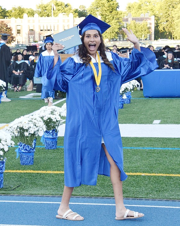 She did it! Allison Recinos almost seems in disbelief to decisively be done with high school.