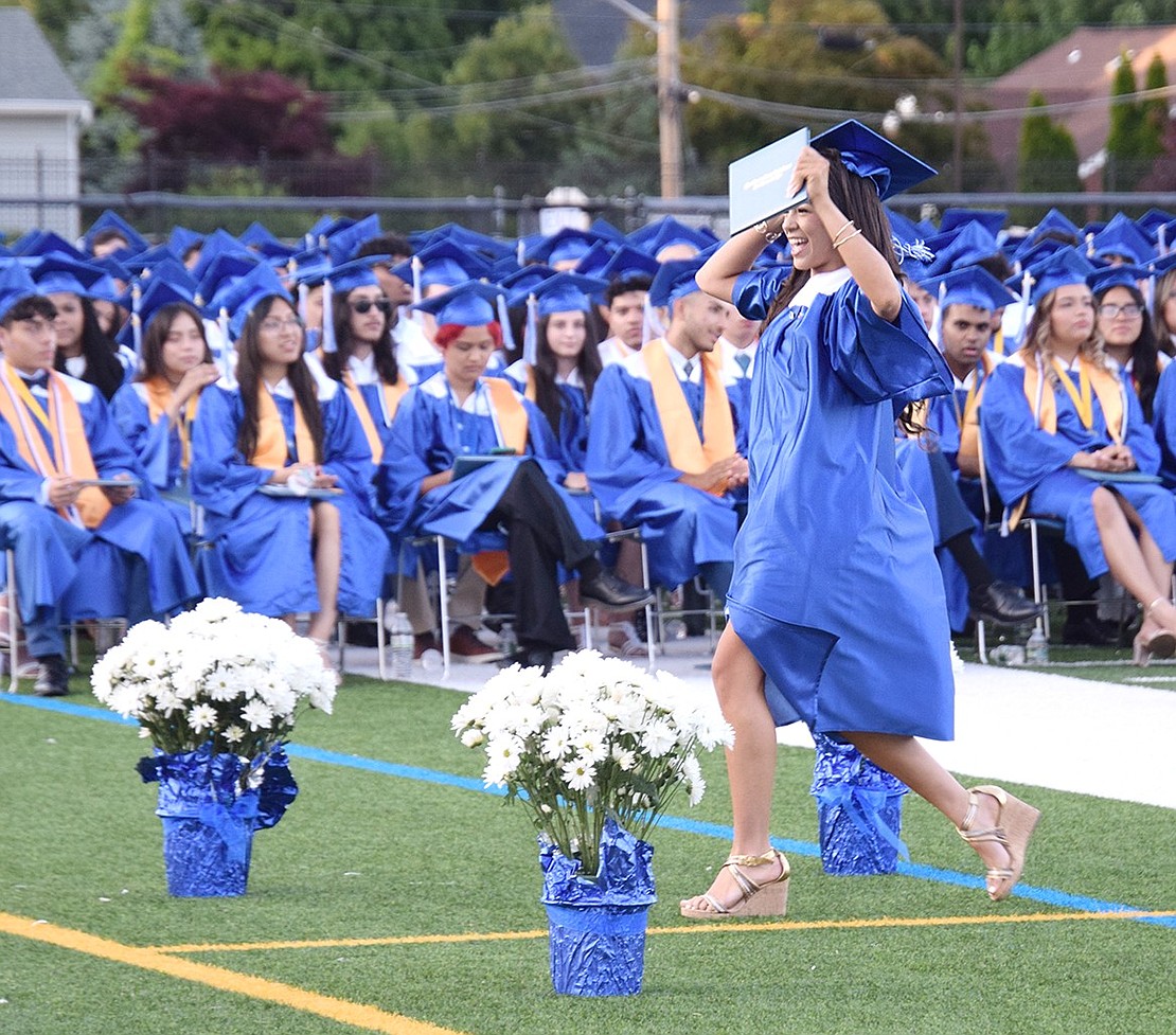 Nothing can stop Olivia Tejeda as she dances and heads down the aisle with her diploma in hand.