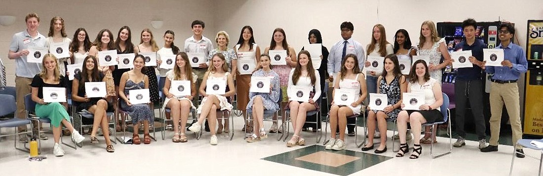 State Senator Shelley Mayer stands with students in the Blind Brook High School cafeteria on June 13 after awarding them Citizenship and Youth Leadership awards. Of the 30 teens awarded, two are from Port Chester High School, while five represented Blind Brook.