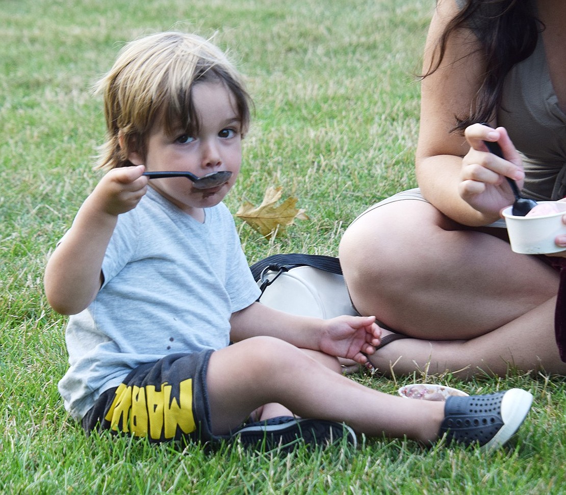 Reid Popkin, a 2-year-old Rye Brook resident, isn’t afraid to get a little messy so long as he gets some chocolate ice cream.