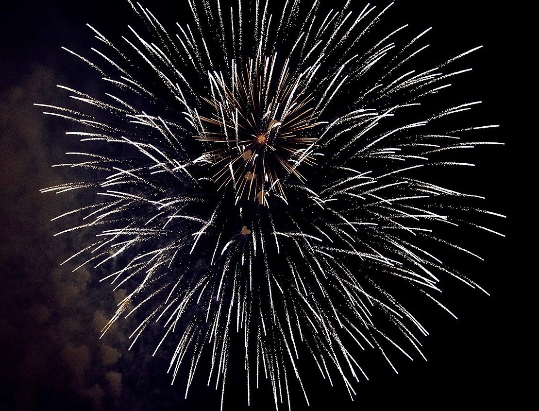 Fireworks fill the sky as seen from Ryan Stadium.