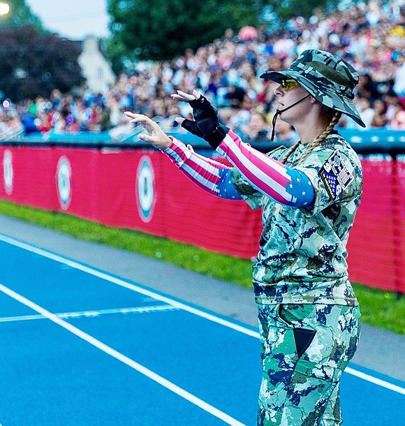 Madeline Rende of Port Chester directs The Saints Brigade.