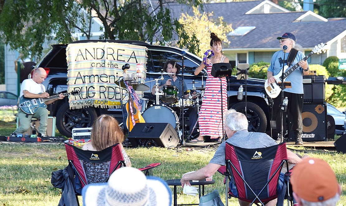 Kicking off the Village of Rye Brook’s summer concert series, Andrea and the Armenian Rug Riders set up in a shady part of Pine Ridge Park and sing “You’re So Vain” to attendees.