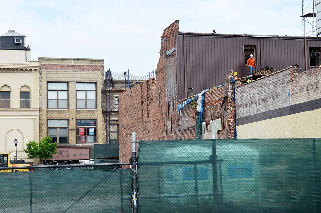 Preparation for demolition of what was for decades Feinsod’s and then Berger Hardware at 43 North Main St. was taking place Wednesday, July 16.