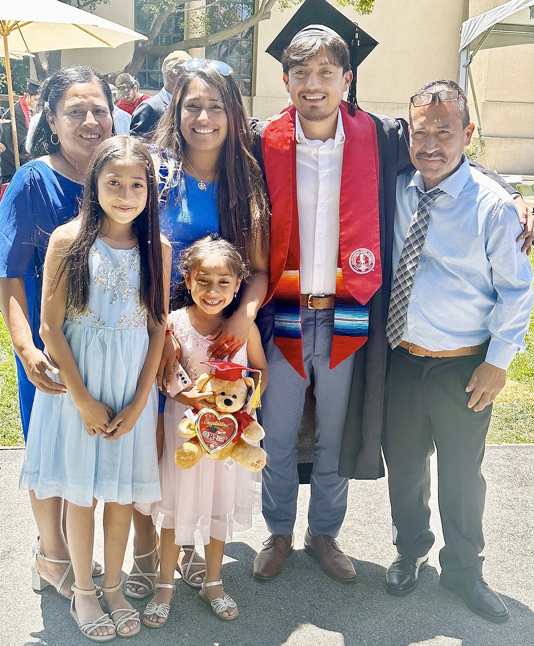 Joseph Tapia with his family on his graduation day from Stanford University June 16. From left, his mom Delia Guzman, sister Karina Orozco, Joseph, his father José Tapia, his older niece Aliyah Orozco and his younger niece Amaya Orozco.