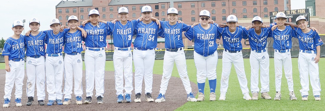 The 10U Port Chester Pirates prepped to play in the White Oak Knockout Ripken Experience in Aberdeen, Md. From left: Jared Friedman, Derek Lovallo, Noah Klauck, Robert Berlingo, Dylan Rivera, Nolan Brown, Charlie Budkins, Myles DeBari, Kyle Renaldo, LJ Sherwood, Gabe Rieke, Daniel Sherwood, Luke Petriello.