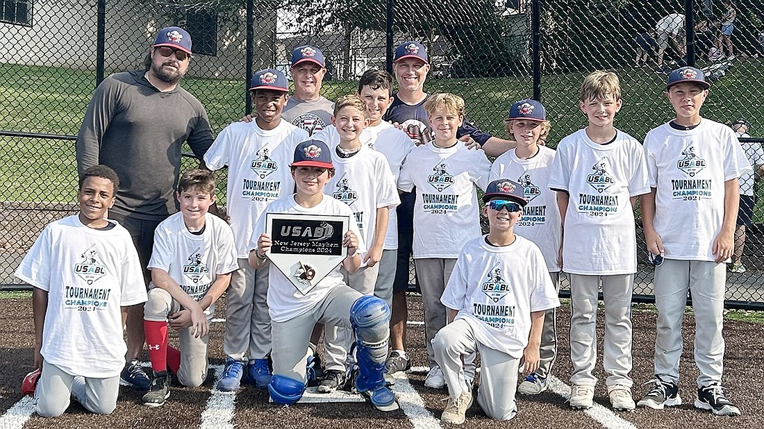 The Rye Brook Rebels 11U team. Seated, from left: James Smith, Jake Morganelli, Chris Holahan, Ryan Sullivan. Standing, from left: Tariq Williams, Kaden Pessin, Everett Robertson, Dylan Klein, Laclan Stein, Arthur Brown, Will McCarthy. Standing in back, from left: Coach Nick Serino, Coach Alex Klein, Coach Jack Pessin. Missing: Peter Ayala.