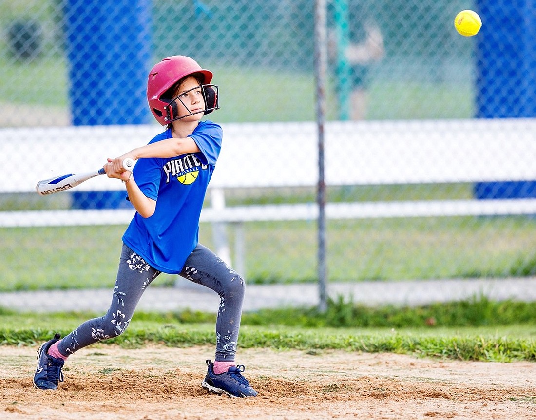 In a Tuesday, July 23 practice at the Port Chester High School softball field, Alessandra Pace keeps her eye on the ball as the newly-formed Port Chester Youth Baseball League-sponsored 11U travel softball team prepares for the upcoming playoffs.