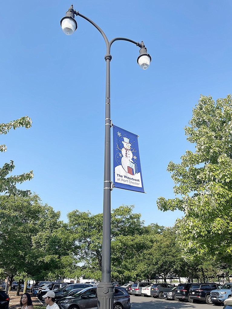 One of the many out of season Waterfront at Port Chester banners in the Marina Parking Lot on Abendroth Avenue.