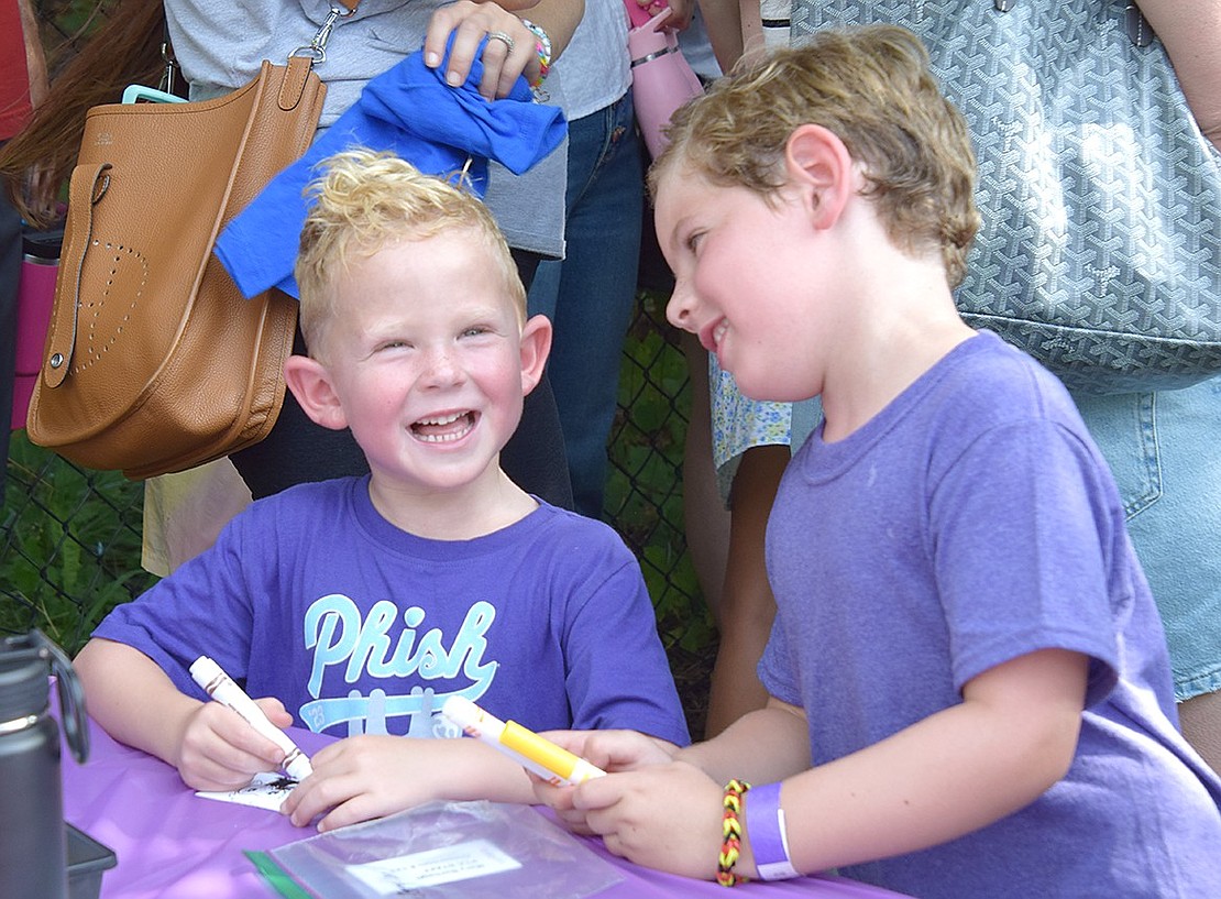 Sebastian Schwartz (left) and Chase Nuzie got lucky—they’ll be starting their Blind Brook Schools career together on Tuesday, Sept. 3, in Christina Mangiaracina’s class. The best buds giggle at each other’s jokes while doing crafts at the PTA’s annual Kindergarten Social on Wednesday, Aug. 28, an event hosted at Ridge Street School to ease the newest Blind Brook students into school by giving them an afternoon to meet each other.