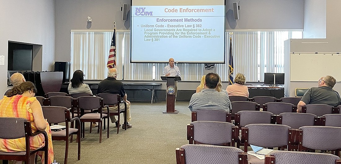 Wade Beltramo, general counsel for the not-for-profit New York Conference of Mayors, speaks to a group of Westchester County municipal leaders on the topic “Code Enforcement: The Foundation of Any Effort to Stem Blight and Decay” at the Port Chester Senior Community Center on Aug. 15 as the first offering in the Village Manager’s Speaker Series.