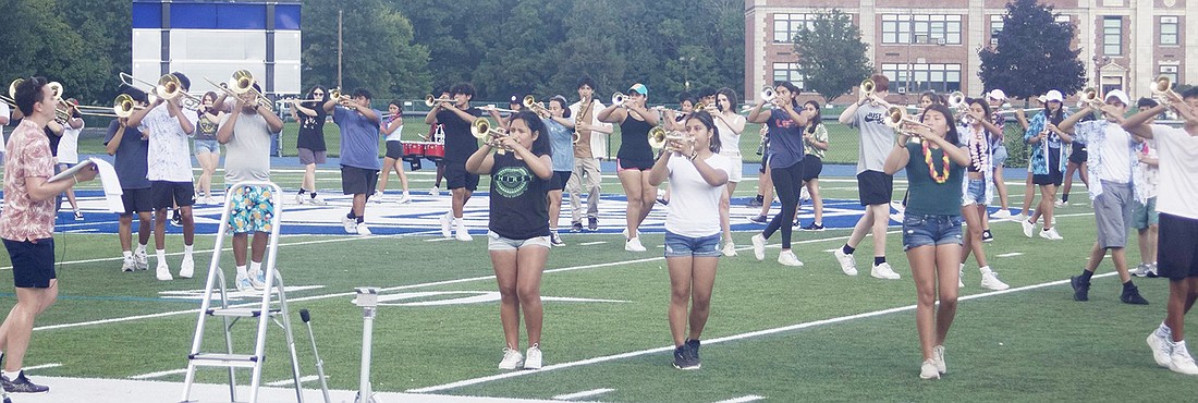 Port Chester High School Marching Band members practice for their fall field show during Band Camp the last week of August on the PCHS football field.