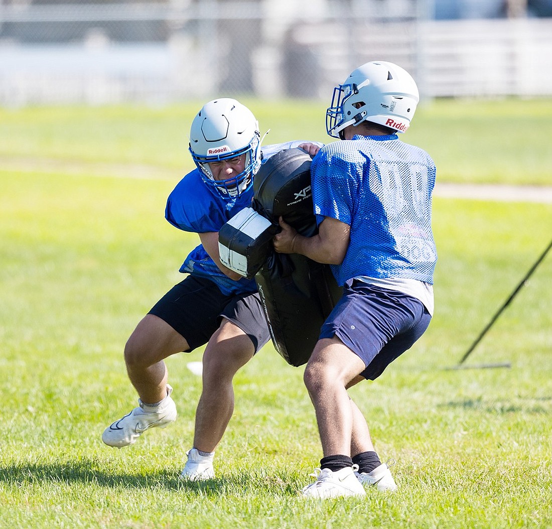 José Antonio Velazquez squares off to get his full weight into the tackling pad during a Rams football tackling drill on Tuesday, Aug. 27 on the Port Chester High School field. The team’s first game will be played on Friday, Sept. 6 at Horace Greeley starting at 6:30 p.m.