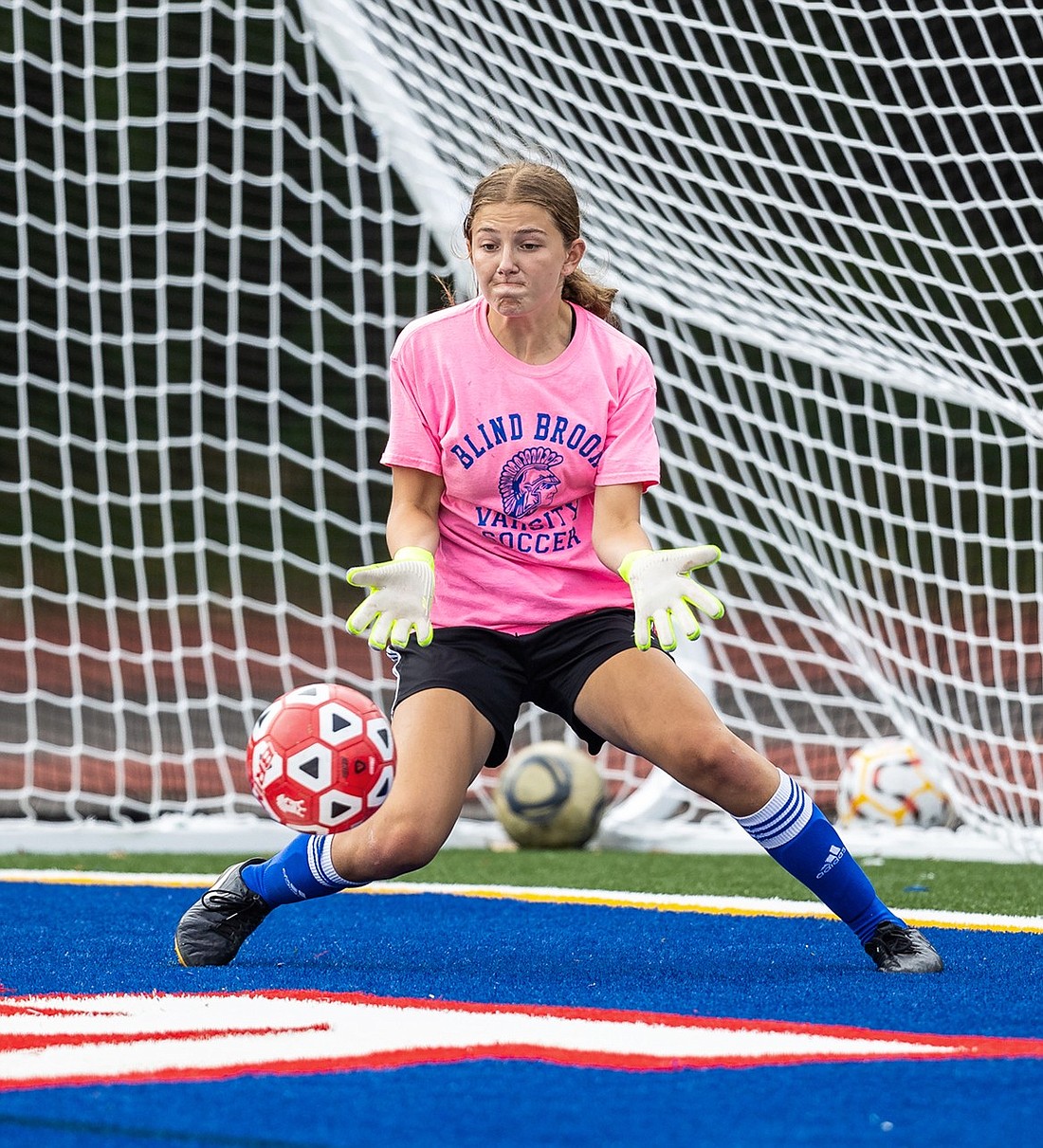 Senior Anna Vnenchak stops a shot in a 3v2 drill during a girls’ varsity soccer practice on the new Blind Brook High School field on Saturday, Aug. 31 before the team’s first game on Tuesday, Sept. 2, the first day of school.