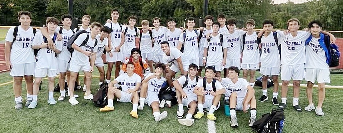 The Blind Brook Trojans pose after their 7-0 win over Putnam Valley on Friday, Sept. 6.