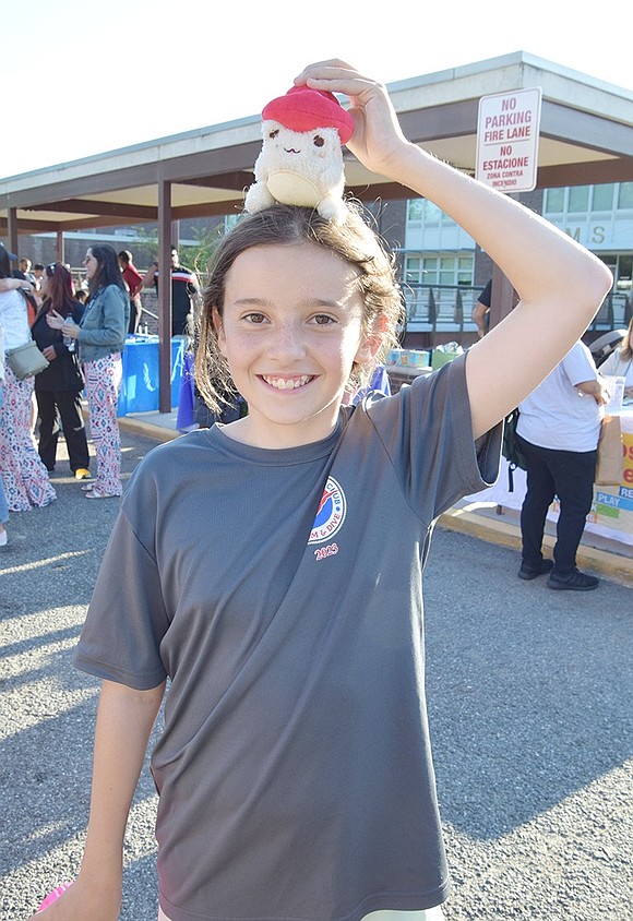 Violet Van der Wateren was pumped to reunite and run around with friends during the party. The Port Chester Middle School seventh-grader takes a beat from the fun to show off Zara Juliana Castellanos, a mushroom plushy she shares with her pals.