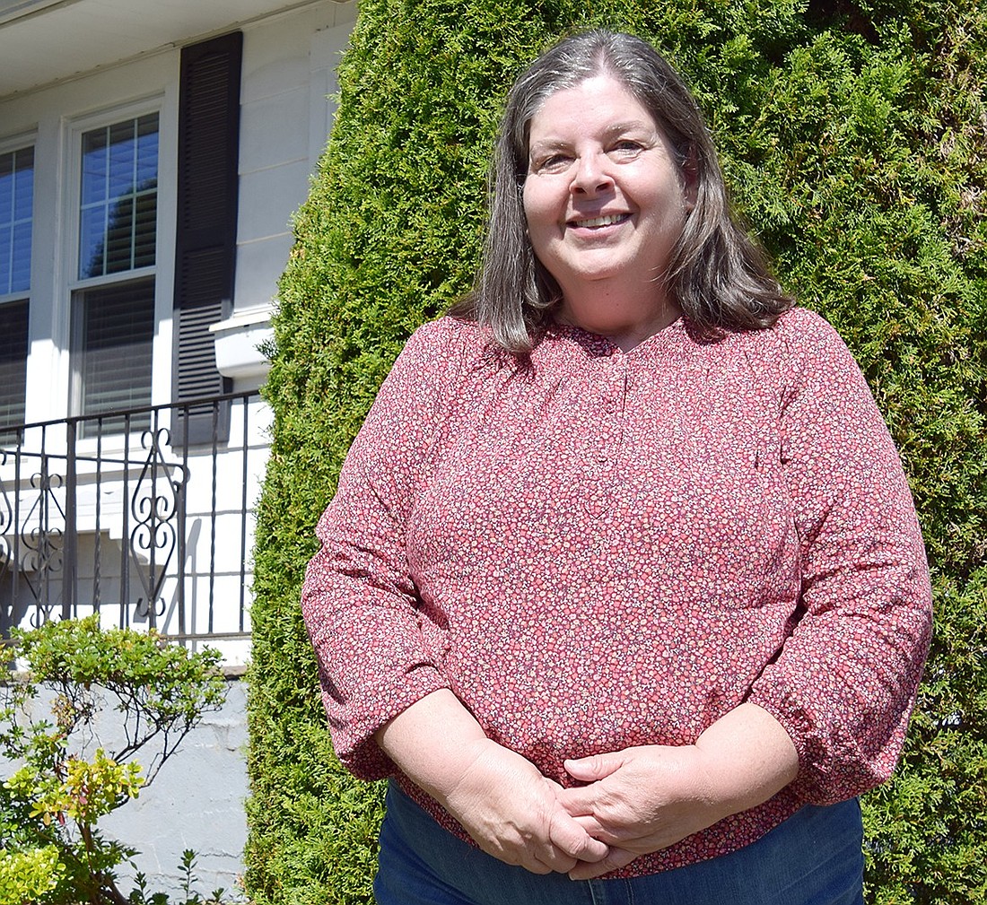 In August, Port Chester resident Toni Sacco retired from a four-decade career with the U.S. Postal Service. She poses for a photo after discussing the often-unnoticed sanctity of the job, and how the industry has evolved.