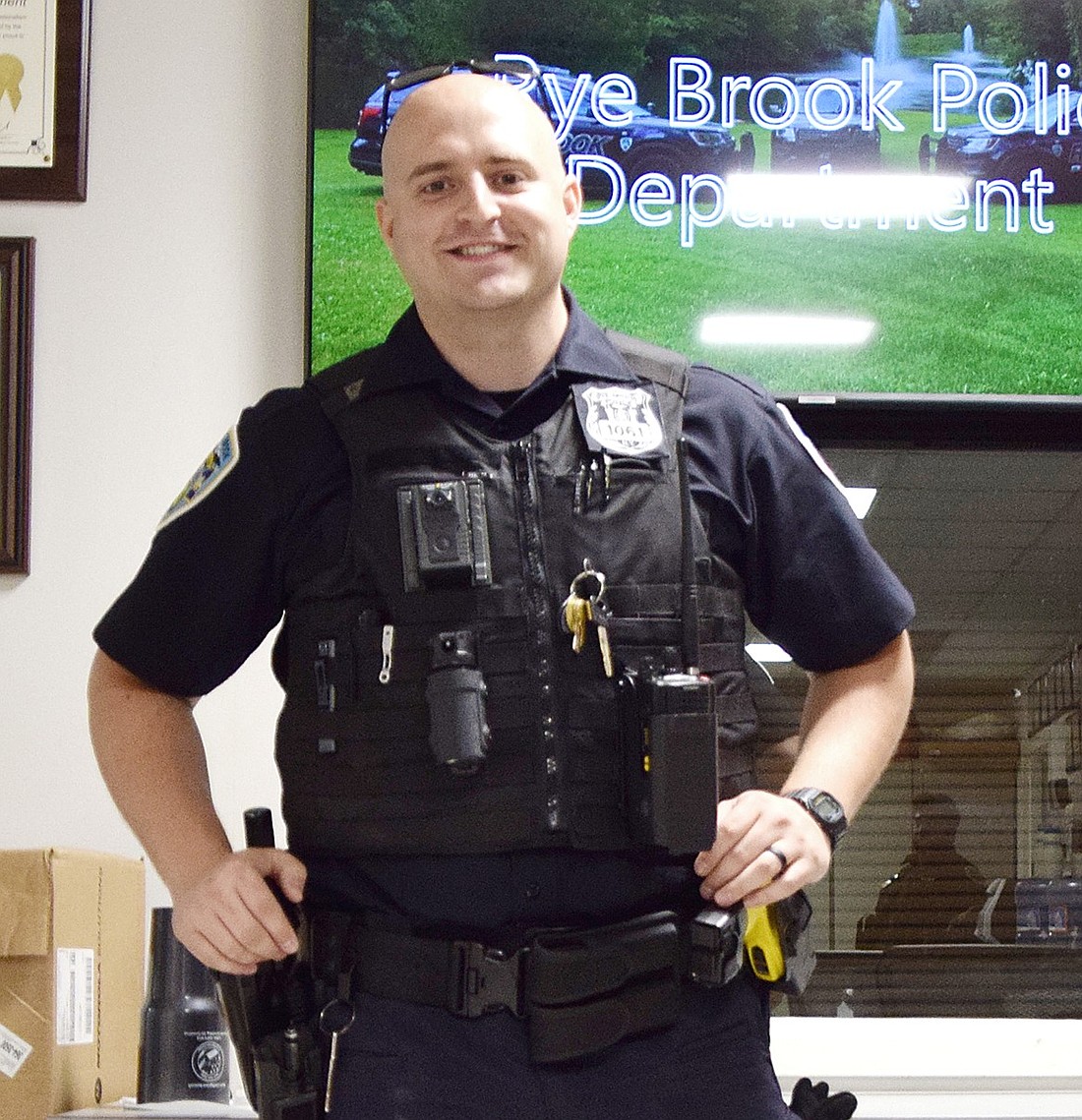 Rye Brook’s newest police officer Darren Sukennikoff poses for a photo in the Rye Brook Police Department headquarters at 938 King St. on Monday, Sept. 16.