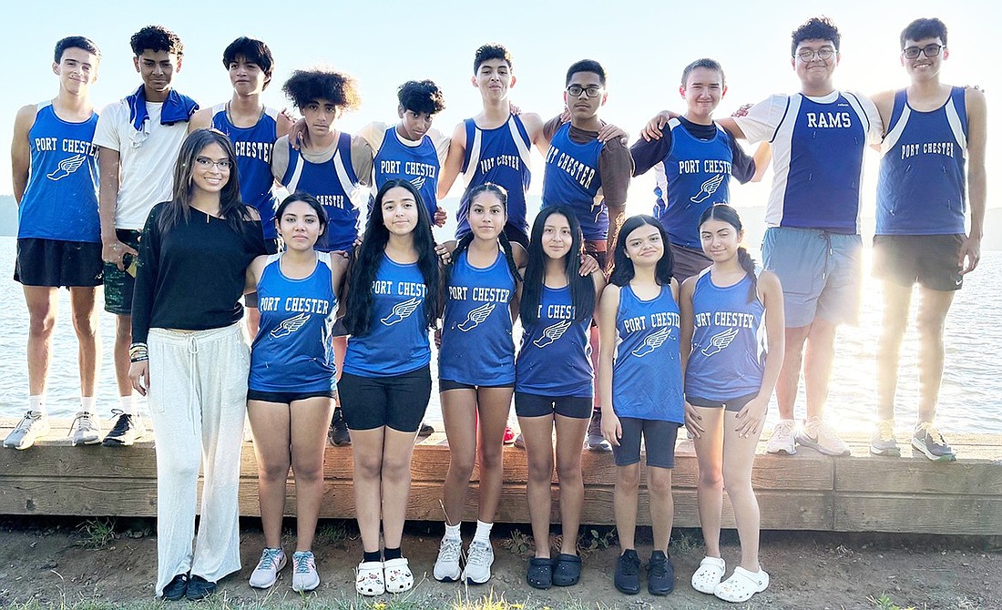 The 2024 Port Chester High School cross-country team lines up for a group shot on Tuesday, Sept. 10 at Croton Point Park. Back row, from left: Santiago Marquez, Chris Evans, Ethan Cabrera, Anthony Delgado, Aaron Abraham, Jencarlos Contreras, Jaylen Avelar, Esvin Eski, Oscar Morales and Christopher Zamora. Front row, from left: Mayerlin Torres, Katheryn Espinoza, Camila Ramos, Alexa Aguiriano, Karla Sigua, Angela Oliveros and Abigail Pesantez.