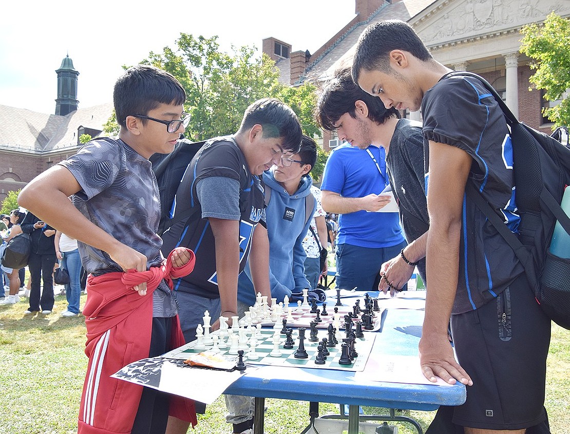 Sophomores Anthony Cardenas (left) and Joseantonio Velasquez engage in an intense game of chess at the club’s table.