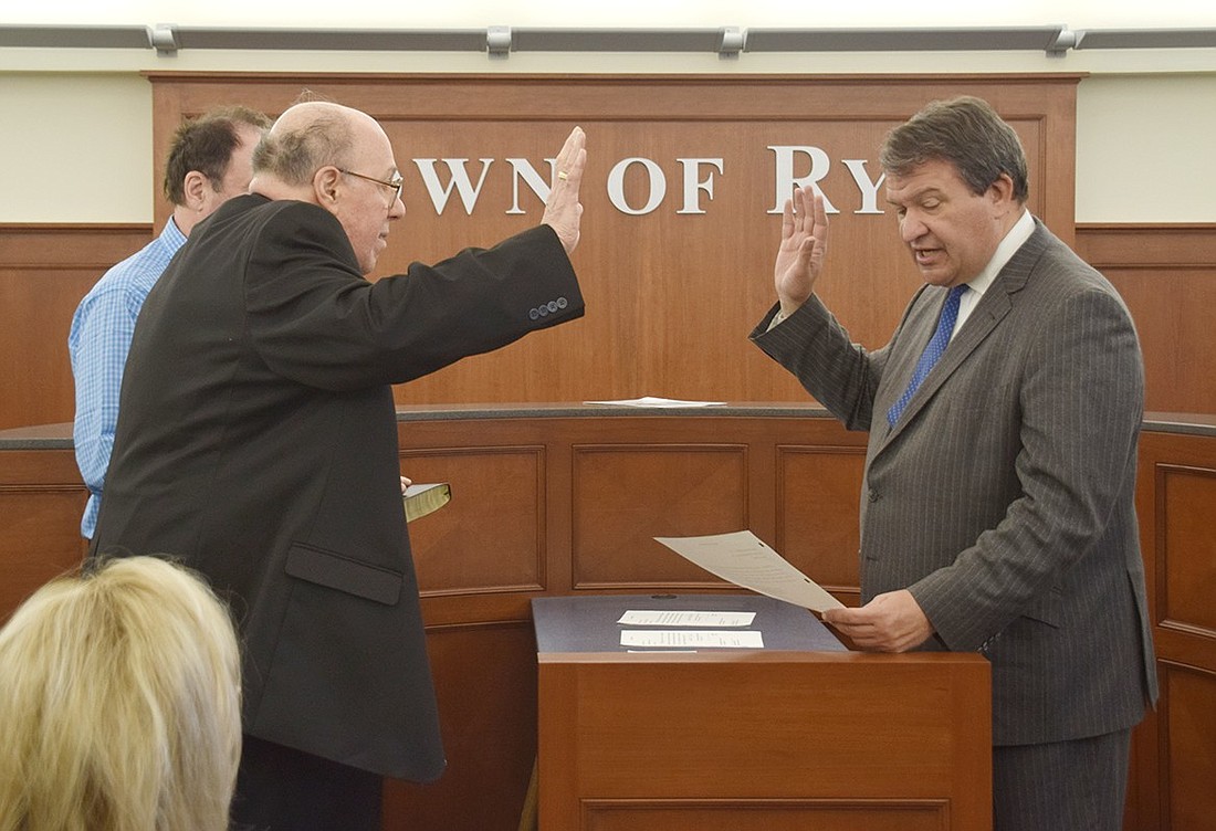 Nick Mecca (left) gets sworn into office as Rye Town receiver of taxes in January 2020. Now a year into his fifth term, the Port Chester resident submitted a resignation notice from the position on Sept. 17.