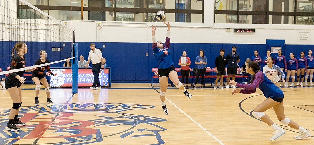 Senior Fernanda Julian jump sets during Blind Brook’s Sept. 13 victory over Croton-Harmon. She is approaching the 1,500 assists milestone during her Blind Brook volleyball career.