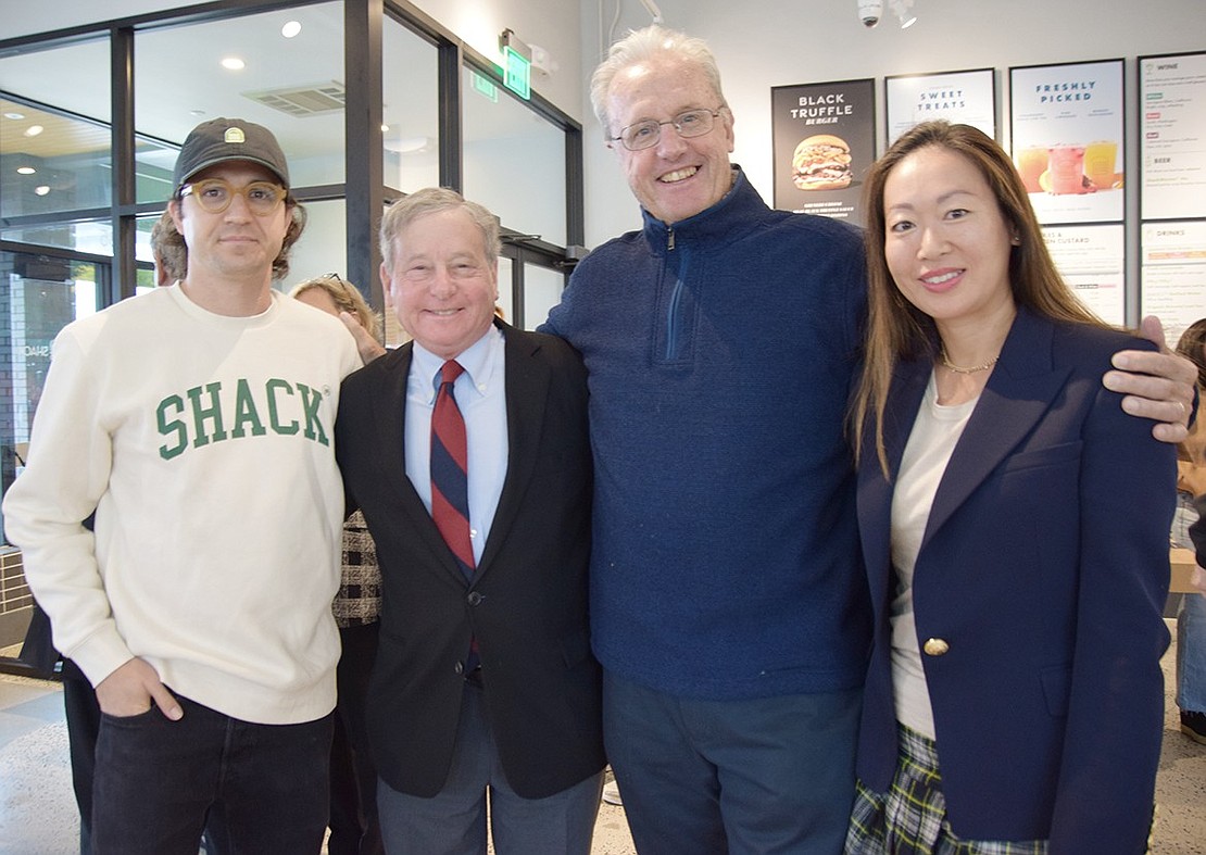 From left, Joe Kaufman, Shake Shack’s regional marketing manager for the Northeast; State Assemblyman Steve Otis; Port Chester Trustee Joe Carvin; and Sylvia Dundon, executive director of the Port Chester-Rye Brook-Rye Town Chamber of Commerce, pose inside the new Port Chester Shake Shack on opening day, Sept. 25. While it’s presently the only restaurant in the Gateway Shopping Center, other vendors with healthy food options are being considered.