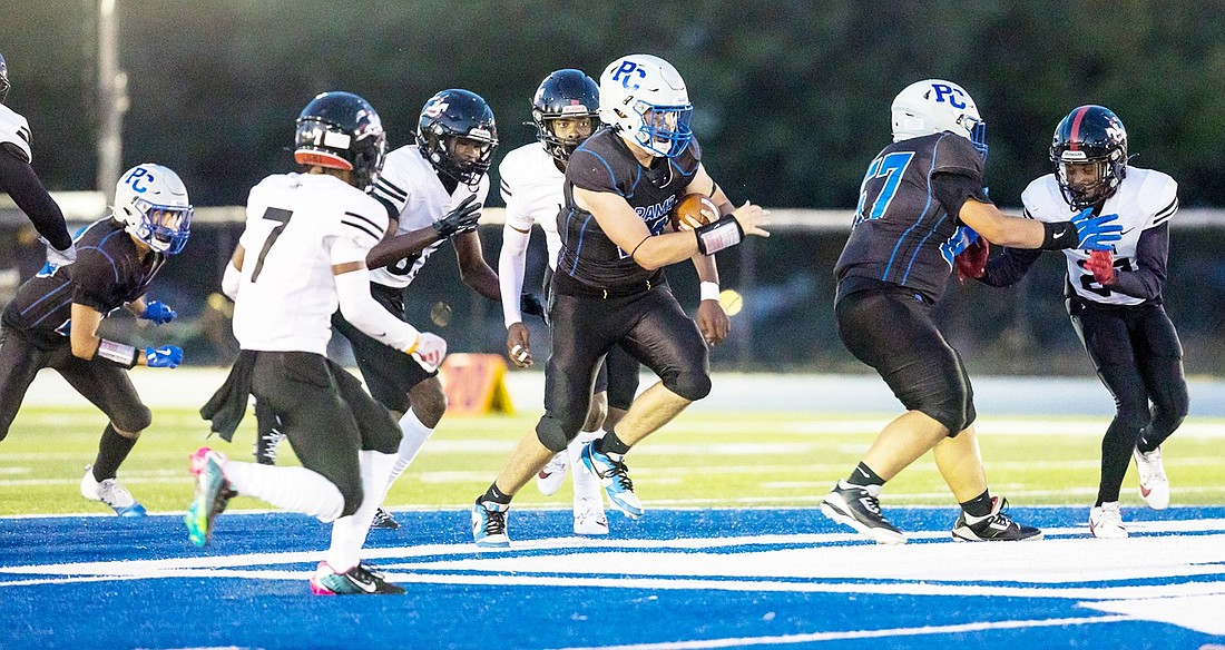 Senior fullback John Pauletti (with the ball) was once again a one-man offense and by far the best back on the field in last Friday night’s (9/27) away game against Peekskill.