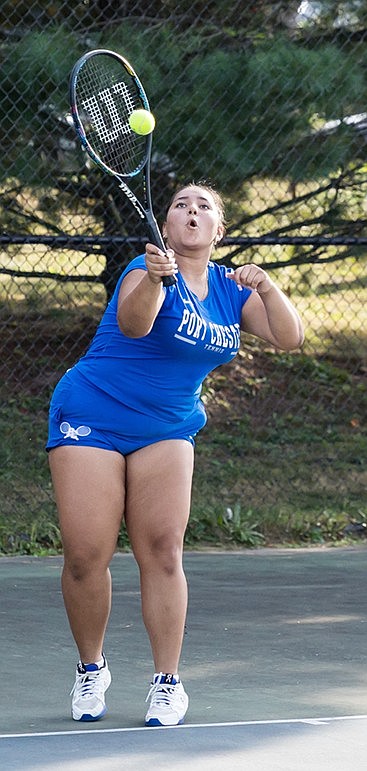 Senior captain Marisabel Rodriguez is one of the top three singles players on the Port Chester High School girls’ tennis team. Here she attacks the ball with finesse during an exhibition match with East Ramapo on Sept. 19.